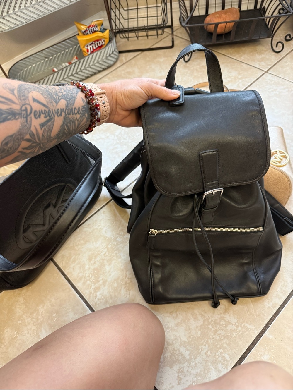 Coach Black Leather Drawstring Backpack with Front Zip